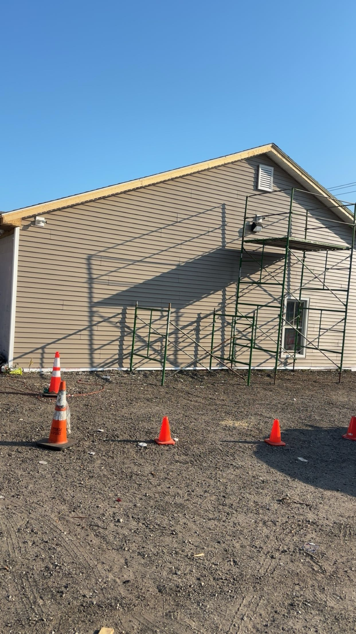 Completed siding installation on a new home build in Lewiston, Maine